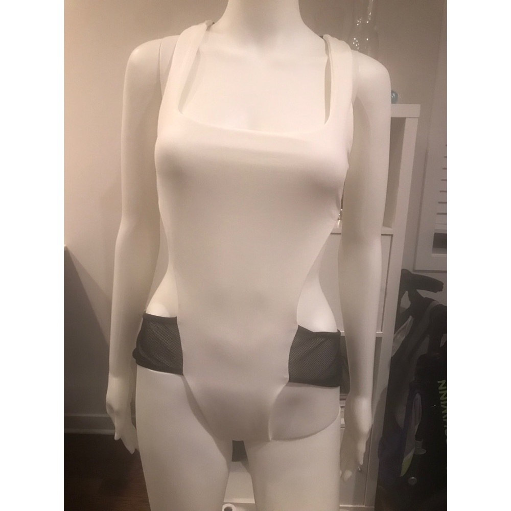 BRAND NEW Cutout swimsuit. Never worn. Sz M